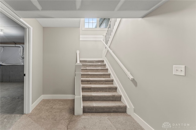 755 W Bentley Cir, Troy, OH 45373 - staircase with carpet floors and baseboards