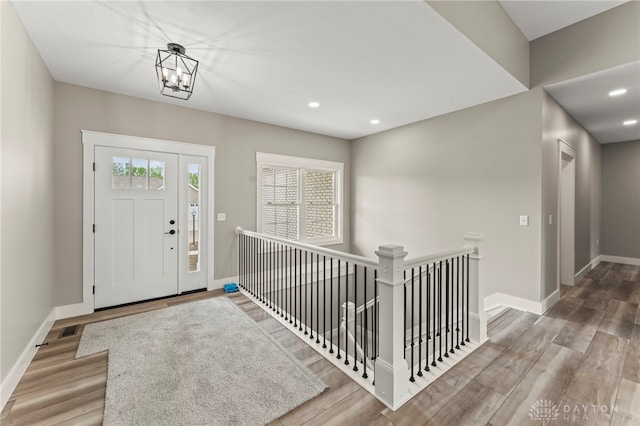 755 W Bentley Cir, Troy, OH 45373 - foyer with wood finished floors, baseboards, recessed lighting, and a chandelier