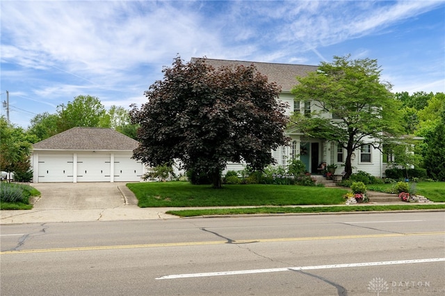 65 N Central Ave, Fairborn, OH 45324 - view of property hidden behind natural elements with a front lawn and concrete driveway