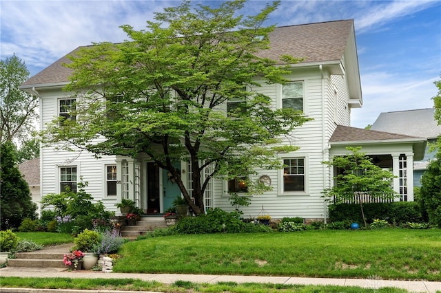 65 N Central Ave, Fairborn, OH 45324 - view of front of house with a shingled roof and a front lawn