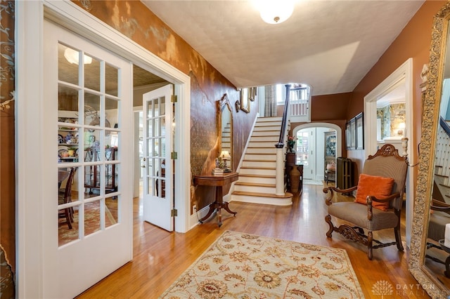 65 N Central Ave, Fairborn, OH 45324 - foyer with stairs, arched walkways, and wood finished floors