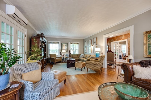 65 N Central Ave, Fairborn, OH 45324 - living area featuring wood finished floors, a wall unit AC, and crown molding