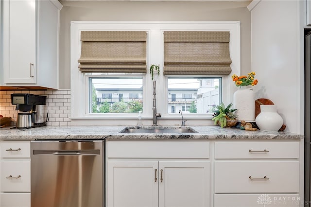 65 N Central Ave, Fairborn, OH 45324 - kitchen with dishwasher, white cabinetry, tasteful backsplash, and light stone counters