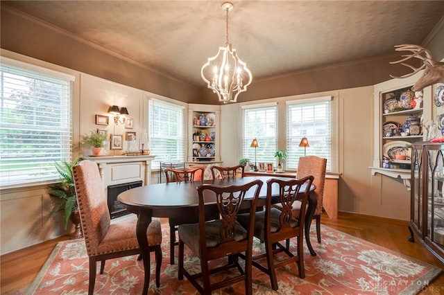 65 N Central Ave, Fairborn, OH 45324 - dining area featuring ornamental molding, a chandelier, and healthy amount of natural light