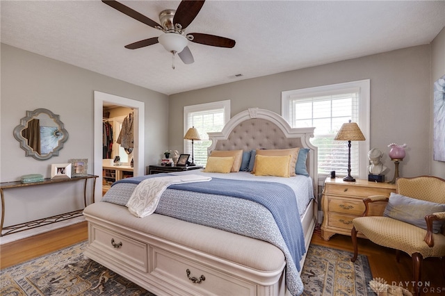 65 N Central Ave, Fairborn, OH 45324 - bedroom featuring wood finished floors, a ceiling fan, and a spacious closet