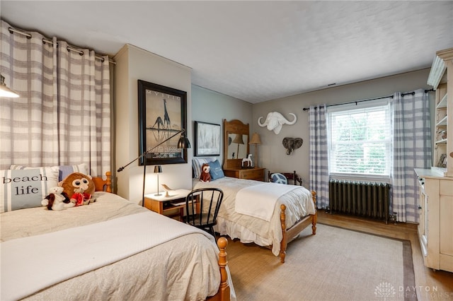 65 N Central Ave, Fairborn, OH 45324 - bedroom with wood finished floors and radiator