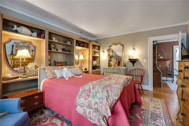 65 N Central Ave, Fairborn, OH 45324 - bedroom featuring crown molding and wood finished floors