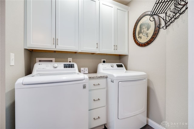 65 N Central Ave, Fairborn, OH 45324 - laundry area featuring washing machine and clothes dryer and cabinet space