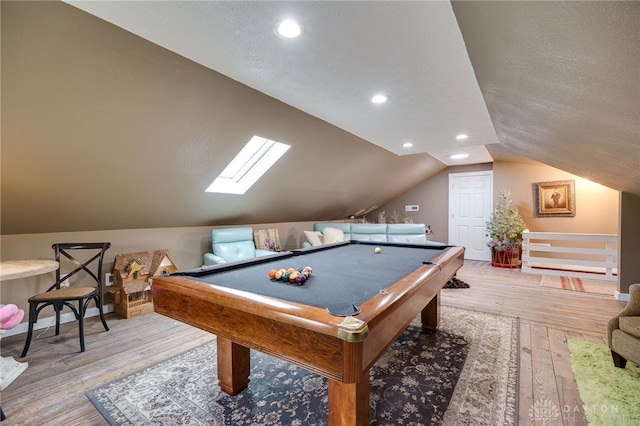 65 N Central Ave, Fairborn, OH 45324 - recreation room with vaulted ceiling, light wood-style floors, a skylight, a textured ceiling, and recessed lighting