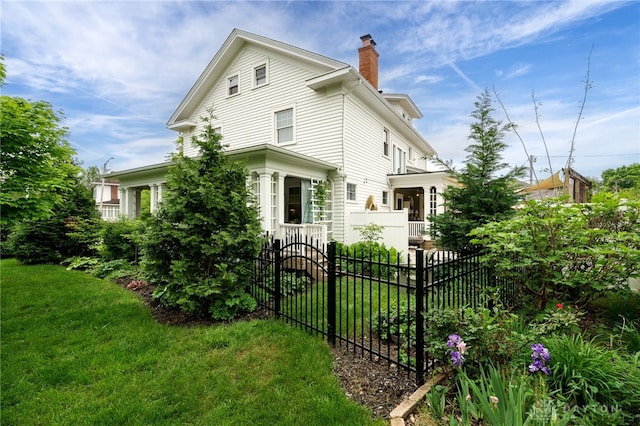 65 N Central Ave, Fairborn, OH 45324 - view of home's exterior featuring a chimney