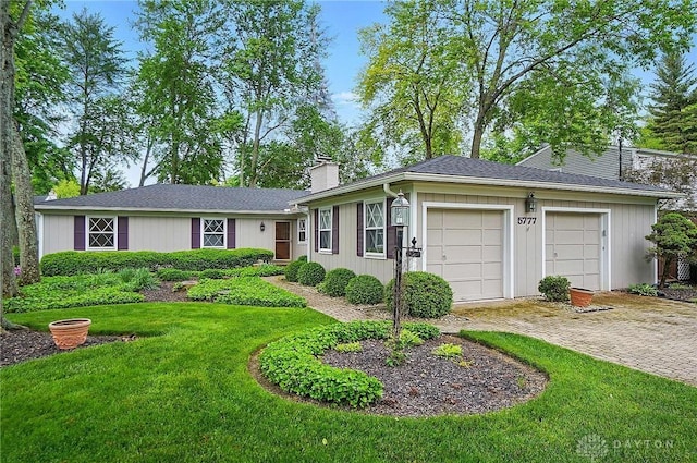 5777 Whitechapel Dr, Cincinnati, OH 45236 - ranch-style house with a garage, driveway, a chimney, and a front yard