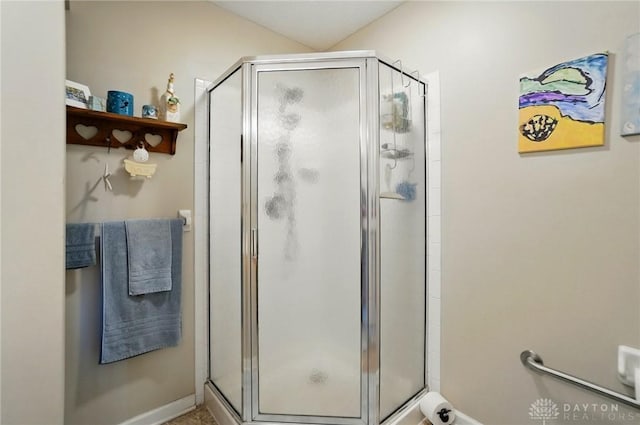 bathroom featuring a stall shower