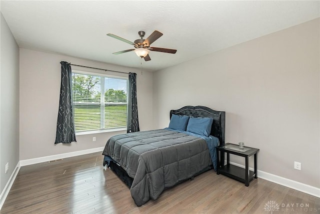 3631 Capitol Ave, Mason, OH 45040 - bedroom with baseboards, wood finished floors, and ceiling fan