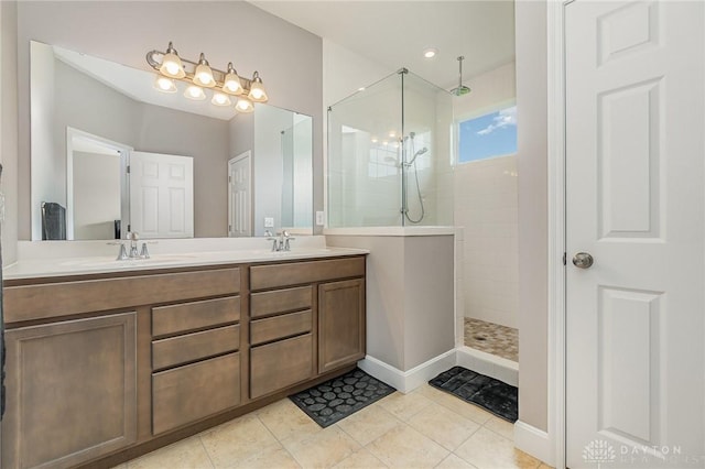 3631 Capitol Ave, Mason, OH 45040 - bathroom featuring walk in shower, double vanity, tile patterned flooring, and baseboards