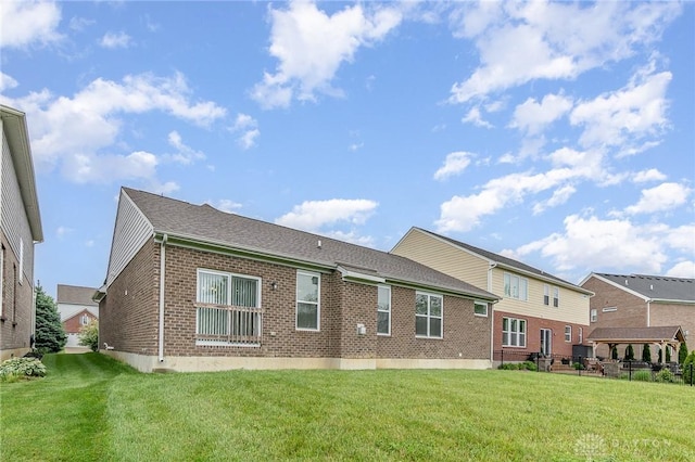 3631 Capitol Ave, Mason, OH 45040 - back of property featuring brick siding and a lawn