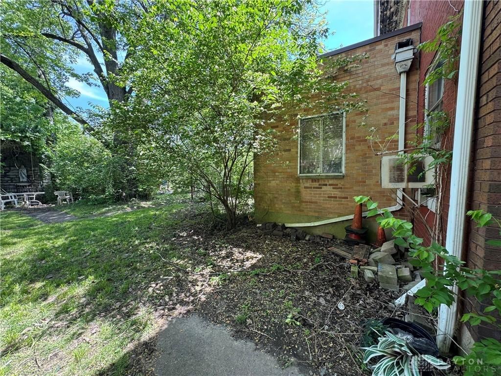 416 N Conover St, Dayton, OH 45402 - view of side of property with brick siding