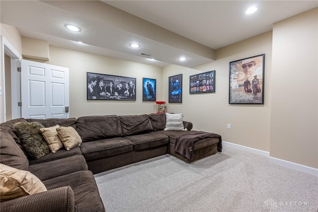 living room featuring carpet flooring, recessed lighting, and baseboards