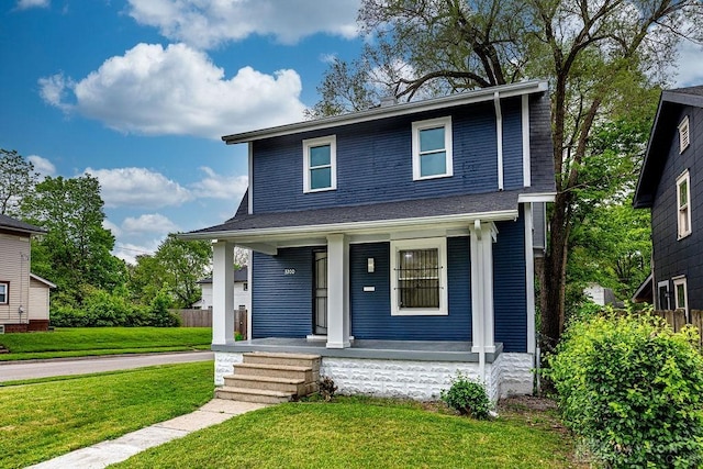 3200 Hoover Ave, Dayton, OH 45402 - view of front facade featuring a porch and a front yard