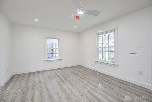 3200 Hoover Ave, Dayton, OH 45402 - unfurnished room featuring healthy amount of natural light, light wood-style flooring, a ceiling fan, baseboards, and recessed lighting
