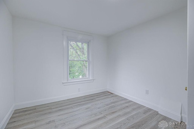 3200 Hoover Ave, Dayton, OH 45402 - empty room with light wood finished floors and baseboards