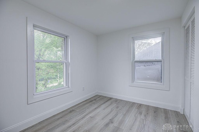 3200 Hoover Ave, Dayton, OH 45402 - unfurnished bedroom featuring light wood-style floors and baseboards