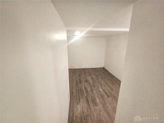 finished below grade area with dark wood-style flooring