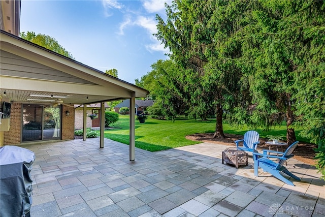 2100 Hunters Bluff Ct, Washington Twp, OH 45458 - view of patio / terrace with an outdoor fire pit, a ceiling fan, and grilling area