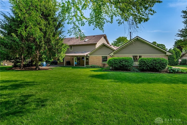 2100 Hunters Bluff Ct, Washington Twp, OH 45458 - view of front facade featuring brick siding and a front yard