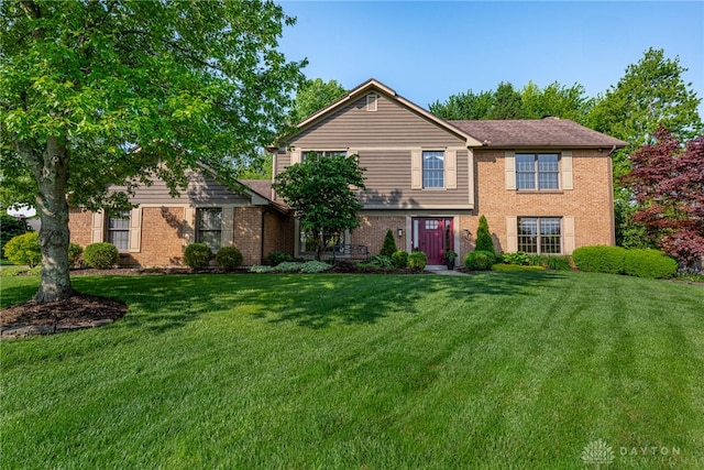 2100 Hunters Bluff Ct, Washington Twp, OH 45458 - view of front of property with brick siding and a front lawn