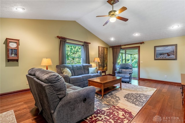 2100 Hunters Bluff Ct, Washington Twp, OH 45458 - living room featuring lofted ceiling, ceiling fan, healthy amount of natural light, baseboards, and wood finished floors