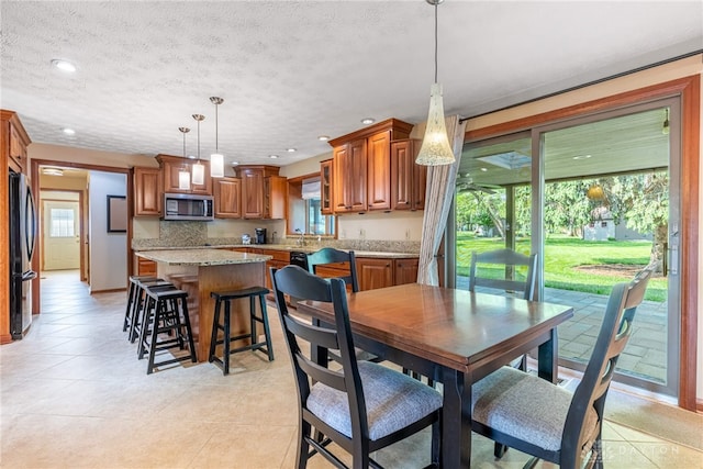 2100 Hunters Bluff Ct, Washington Twp, OH 45458 - dining area with recessed lighting, a textured ceiling, and light tile patterned floors