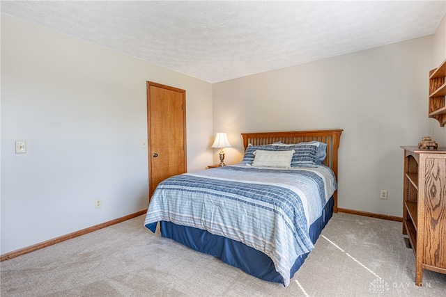 2100 Hunters Bluff Ct, Washington Twp, OH 45458 - bedroom featuring carpet floors, baseboards, and a textured ceiling