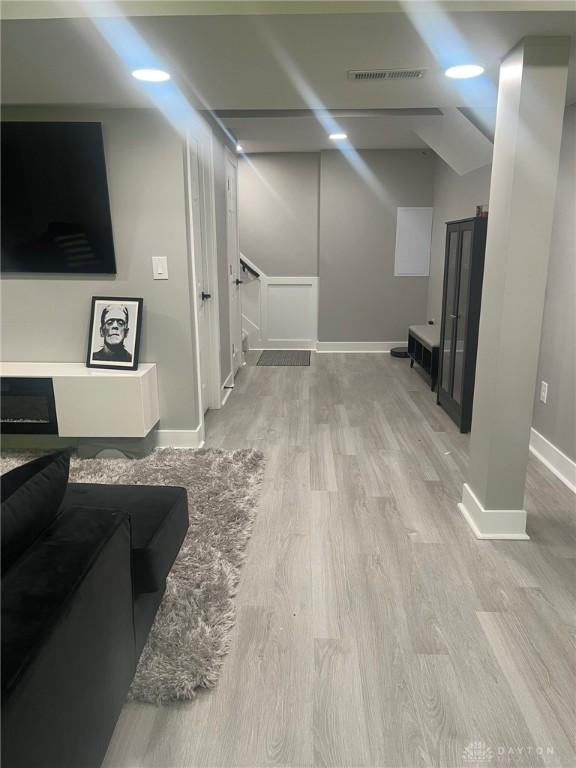 868 Grande Oaks Dr, Morrow, OH 45152 - living area with wood finished floors and baseboards