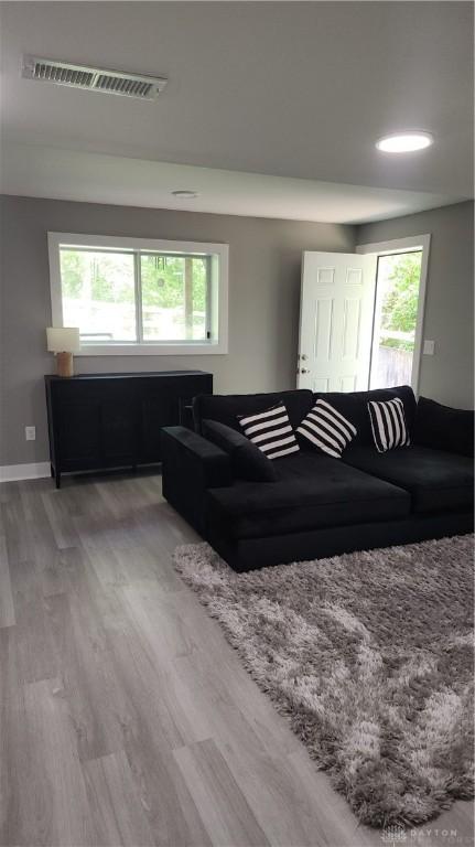 868 Grande Oaks Dr, Morrow, OH 45152 - living room with wood finished floors, plenty of natural light, and baseboards