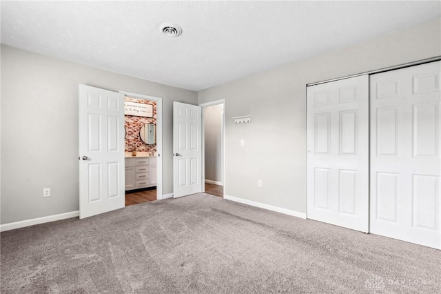7217 State Route 380, Chester Twp, OH 45177 - unfurnished bedroom featuring carpet, baseboards, and a closet