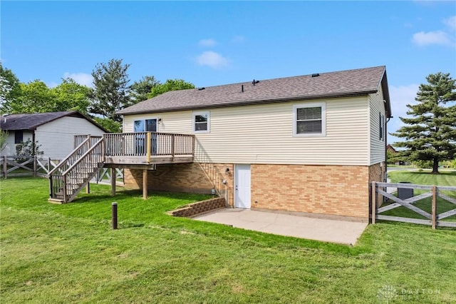 7217 State Route 380, Chester Twp, OH 45177 - rear view of property featuring brick siding, a wooden deck, stairs, a patio, and roof with shingles