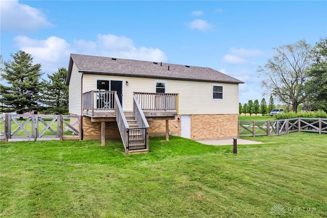 7217 State Route 380, Chester Twp, OH 45177 - back of property featuring stairway, a wooden deck, a gate, a shingled roof, and brick siding