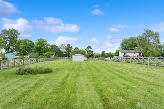 7217 State Route 380, Chester Twp, OH 45177 - view of yard with a storage unit, an outbuilding, and a view of countryside