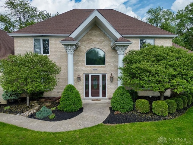 1656 Fox Trl, Bellbrook, OH 45305 - view of front of home with brick siding and a shingled roof