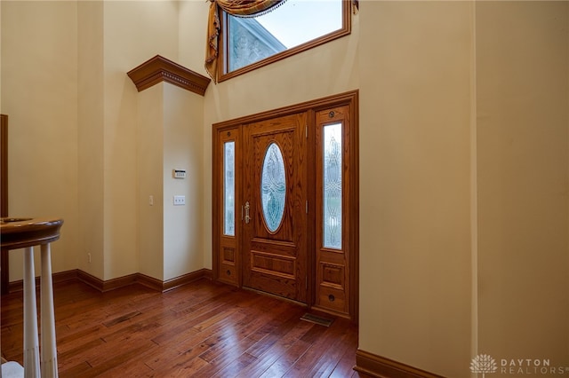 1656 Fox Trl, Bellbrook, OH 45305 - foyer with dark wood finished floors, a towering ceiling, and baseboards