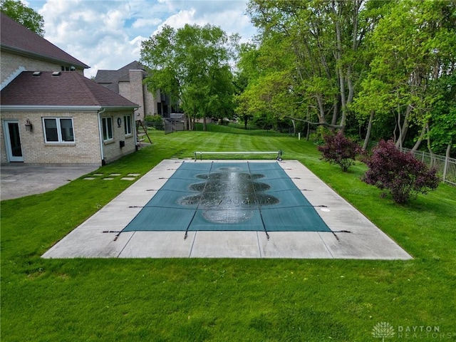 1656 Fox Trl, Bellbrook, OH 45305 - view of swimming pool with a covered pool and a patio