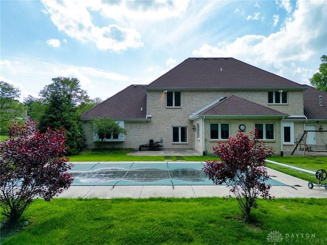 1656 Fox Trl, Bellbrook, OH 45305 - view of pool featuring a lawn and a patio