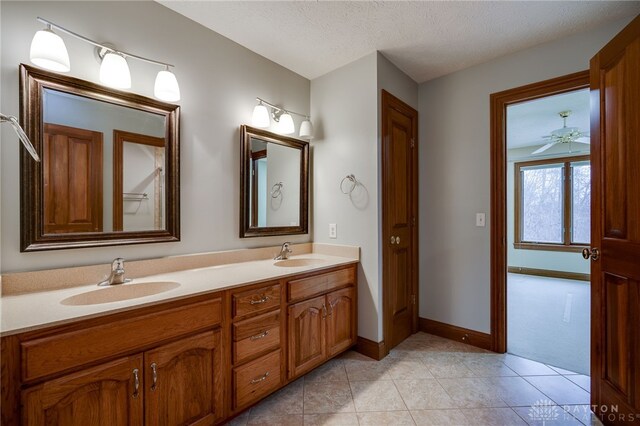 1656 Fox Trl, Bellbrook, OH 45305 - bathroom with tile patterned floors, baseboards, and double vanity