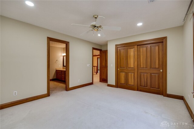 1656 Fox Trl, Bellbrook, OH 45305 - unfurnished bedroom featuring light colored carpet, baseboards, recessed lighting, connected bathroom, and ceiling fan
