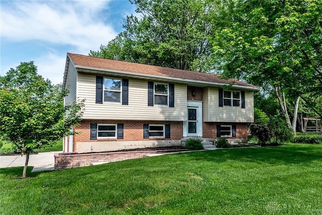 6399 Kimberly Dr, Fairfield Twp, OH 45011 - split foyer home with a front yard and brick siding
