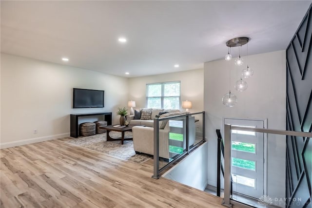 6399 Kimberly Dr, Fairfield Twp, OH 45011 - living area with light wood-style floors, baseboards, and recessed lighting