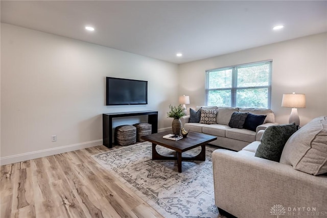 6399 Kimberly Dr, Fairfield Twp, OH 45011 - living room with light wood-style flooring, recessed lighting, and baseboards