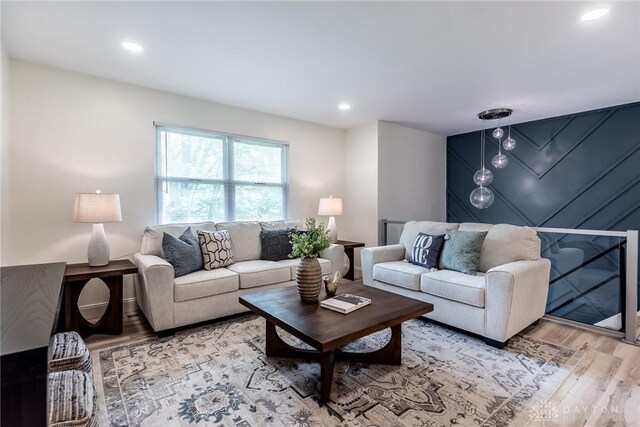 6399 Kimberly Dr, Fairfield Twp, OH 45011 - living room featuring light wood-style floors and recessed lighting