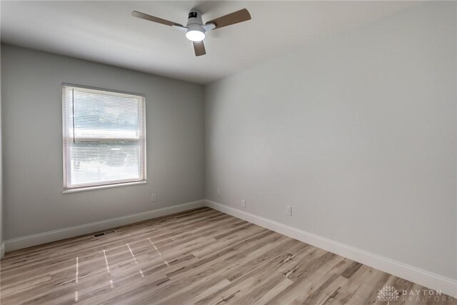 6399 Kimberly Dr, Fairfield Twp, OH 45011 - empty room featuring light wood-type flooring, a ceiling fan, and baseboards