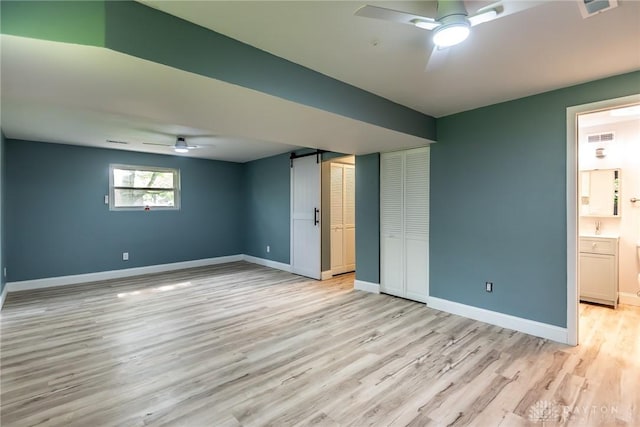 6399 Kimberly Dr, Fairfield Twp, OH 45011 - unfurnished bedroom featuring light wood finished floors, baseboards, and a ceiling fan